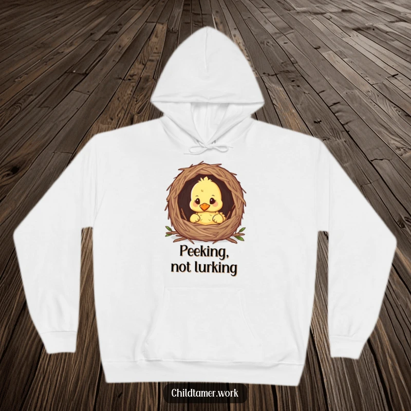 Funny duckling peeking from a nest on a warm hoodie, embodying coziness and playful curiosity.